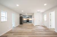 New cabinets, quartz counter tops, GE Stainless Steel Refrigerator, Range, Dishwasher, and Microwave.  New LVP flooring, paint, and fixtures!