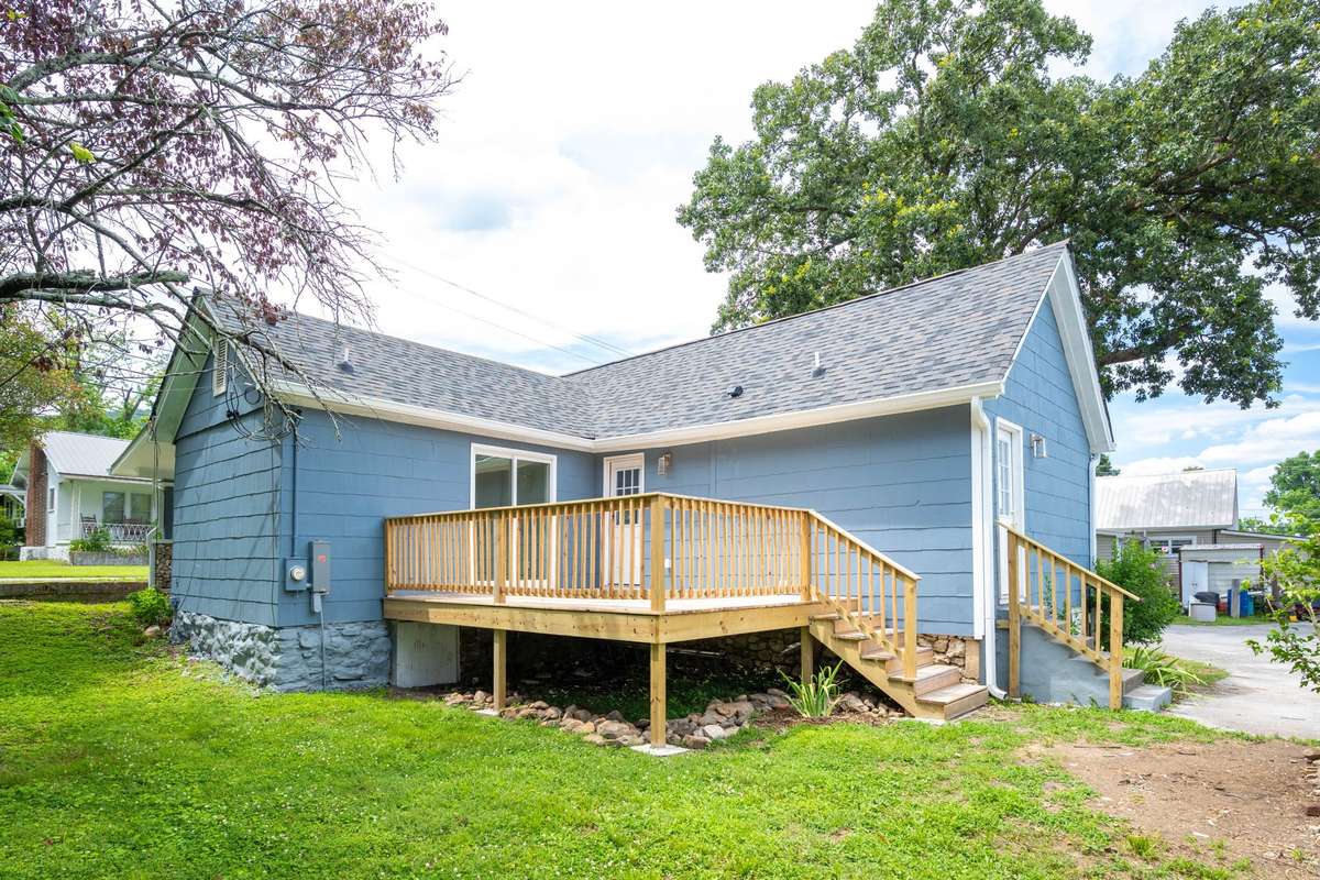 New wood deck, new roof and exterior paint.