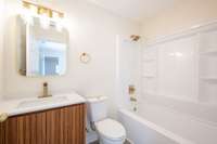 Spacious Tub/Shower Combo, brand new, along with new vanity, toilet, fixtures, flooring, and paint.