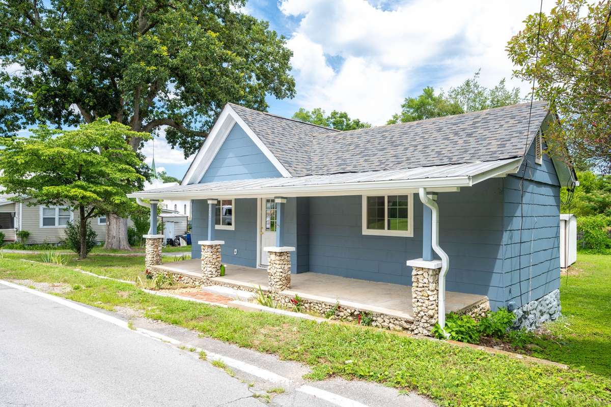 Fully renovated inside and out, including a new roof, new windows and exterior paint-- shown here.