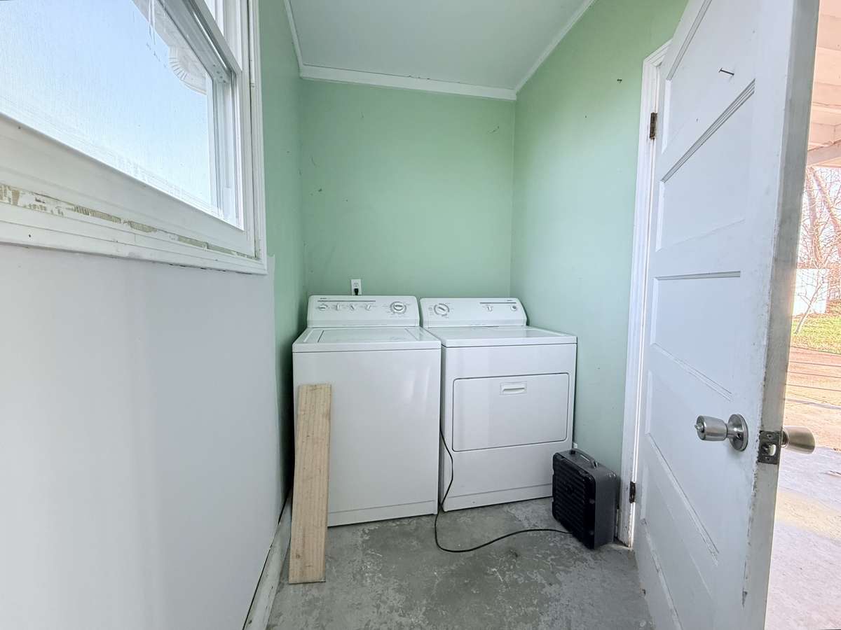 Laundry room located off from the carport