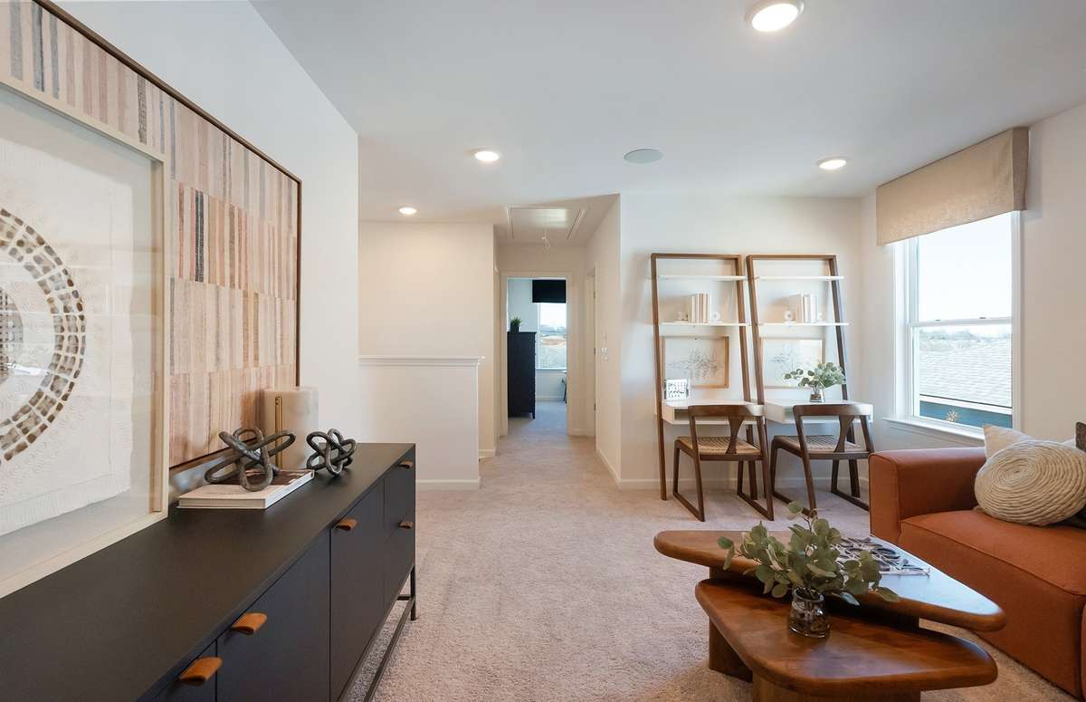 ***Photo is from a brand new Rosella home*** We also have set up the loft to include a homework zone! Plenty of flexibility with how to utilize this space.