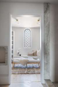 An expansive, private walk-in closet with laundry hookups