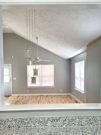 A cozy pass-through connects the kitchen to the heart of the home.