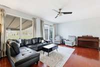 Large living room with two oversized windows providing great natural light & ceiling fan. 1454 Indian Pl Murfreesboro TN 37129