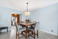 Your dining room has a modern light fixture & calming color scheme. 1454 Indian Pl Murfreesboro TN 37129