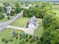 Notice the extra wide concrete when backing out of garage!