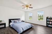 Primary bedroom with two windows providing nice natural lighting & ceiling fan.101 Briston Ct Murfreesboro, TN 37127