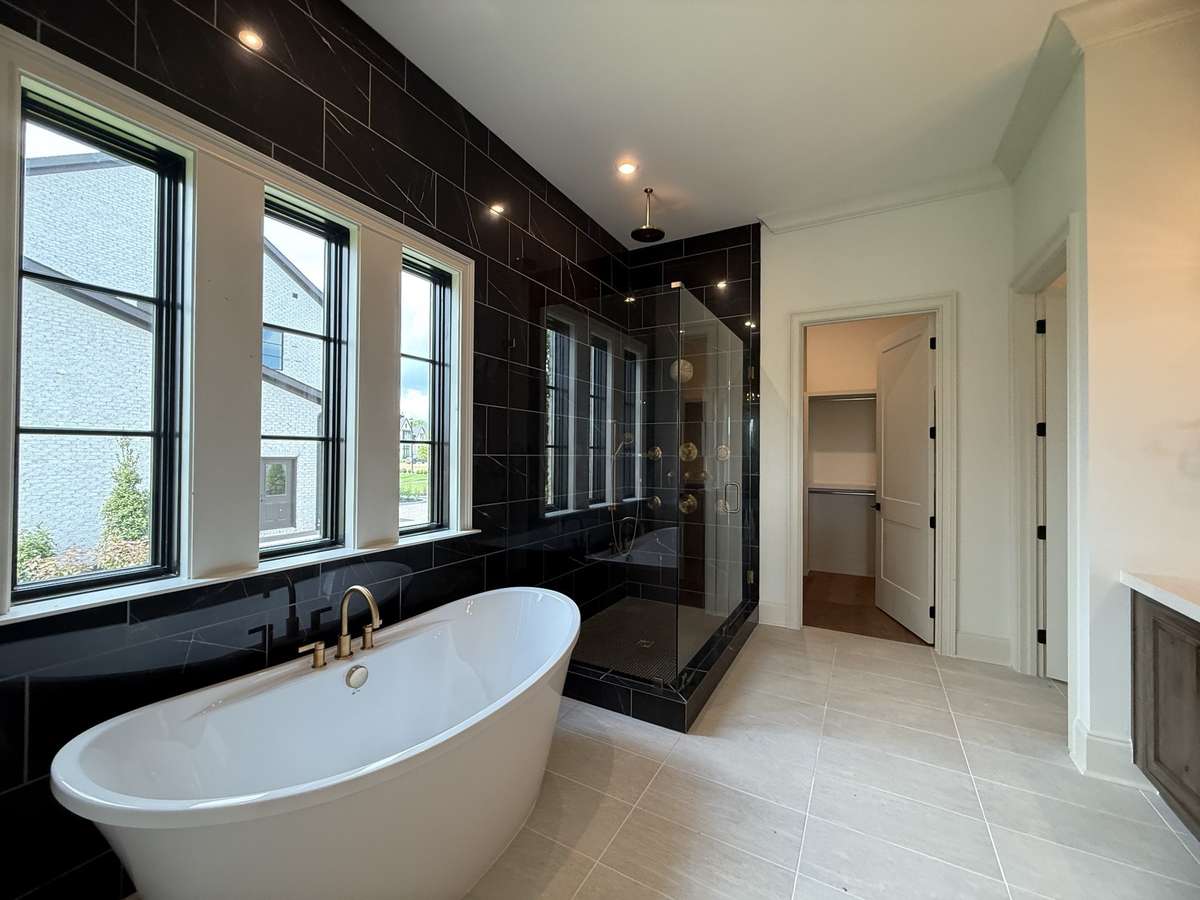 Photos represent another Rutledge plan built with custom items & reflects optional items & upgrades.