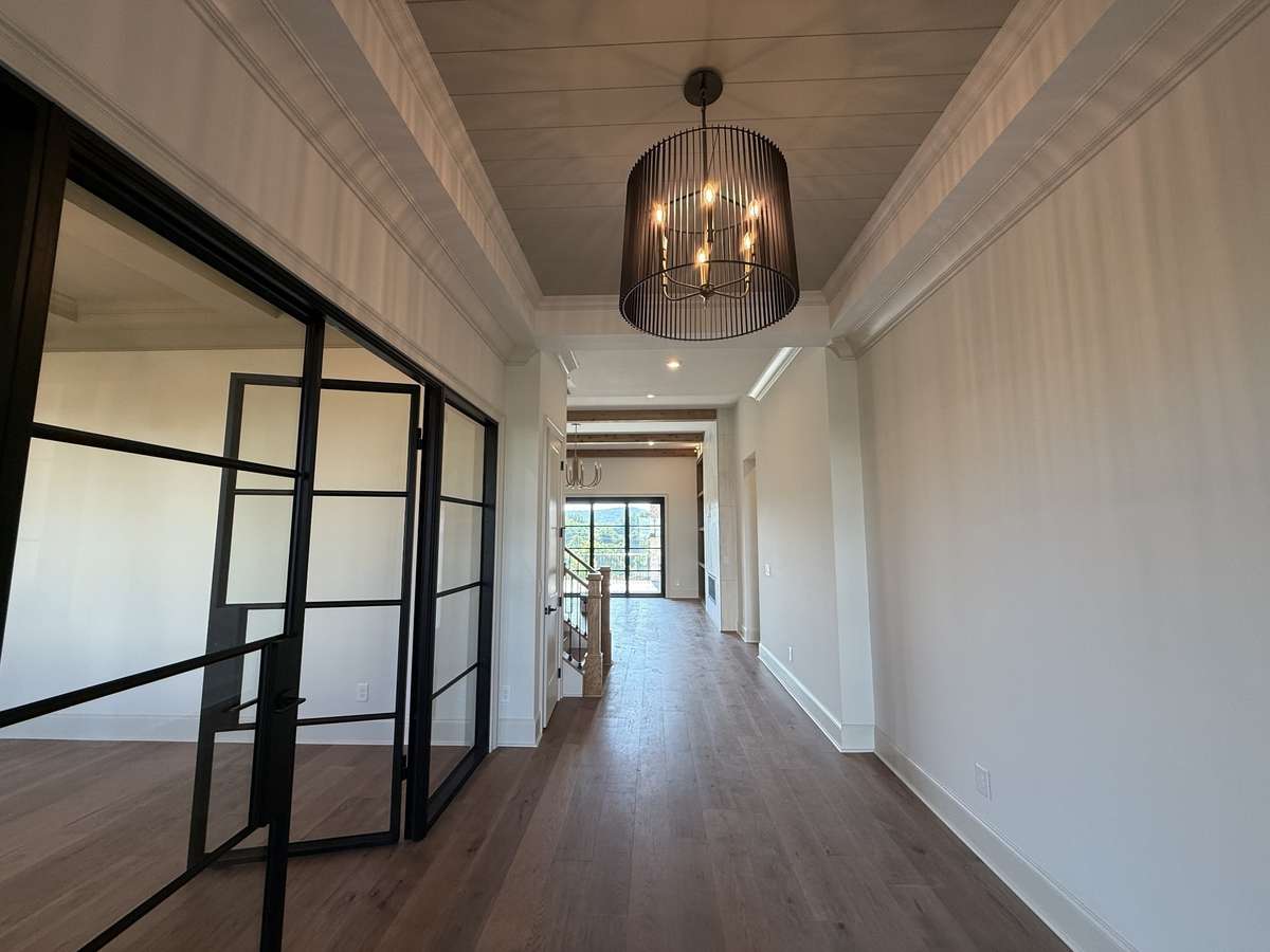 Photos represent another Rutledge plan built with custom items & reflects optional items & upgrades.