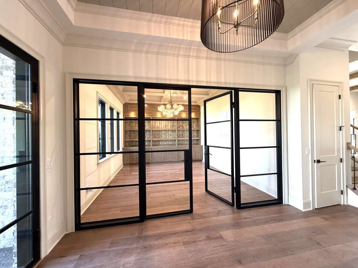 Photos represent another Rutledge plan built with custom items & reflects optional items & upgrades.