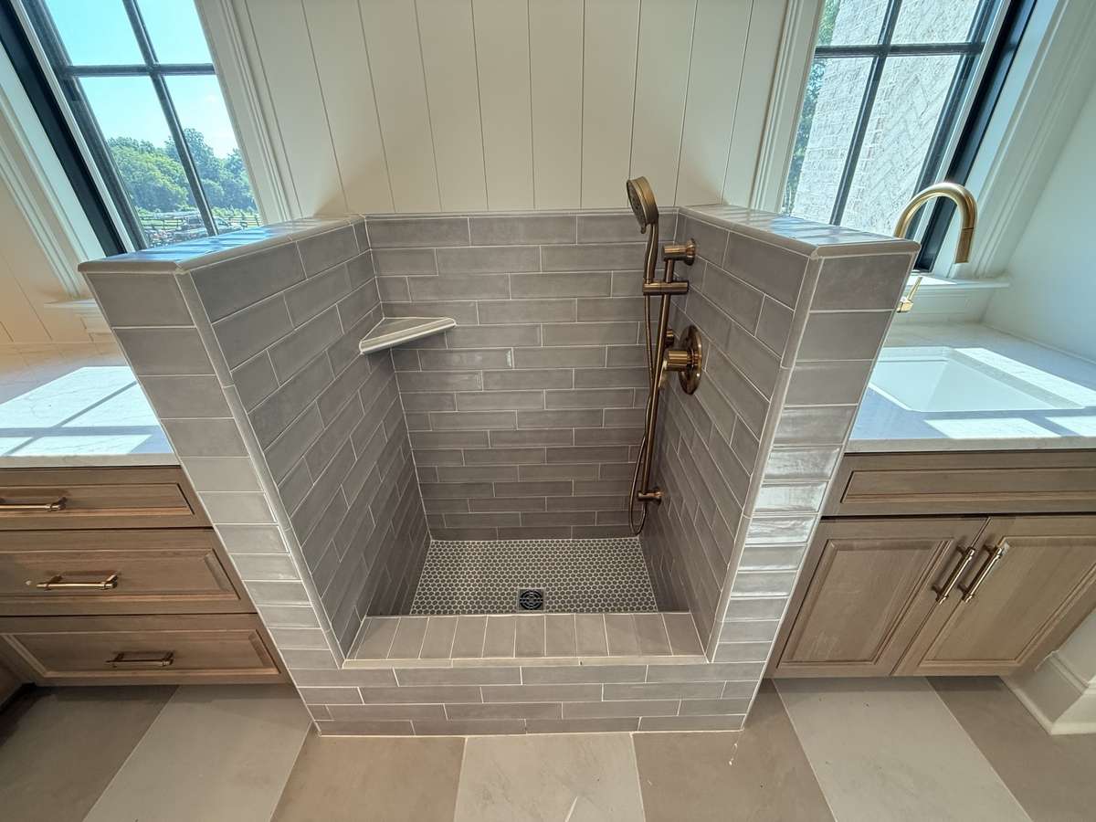 Photos represent another Rutledge plan built with custom items & reflects optional items & upgrades.