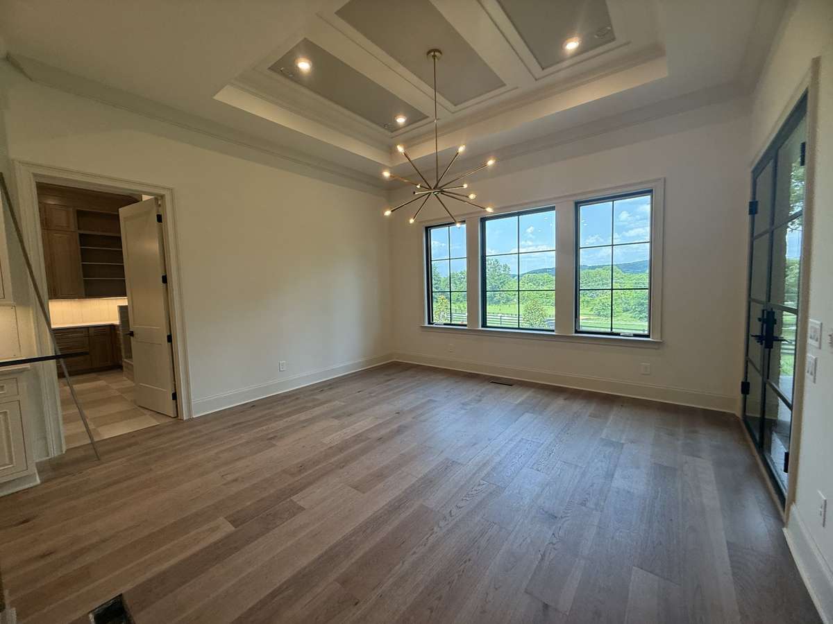 Photos represent another Rutledge plan built with custom items & reflects optional items & upgrades.