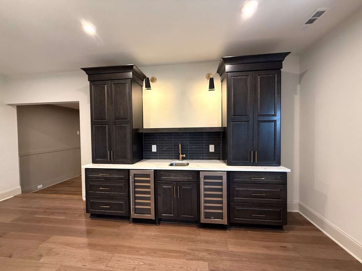 Photos represent another Rutledge plan built with custom items & reflects optional items & upgrades.