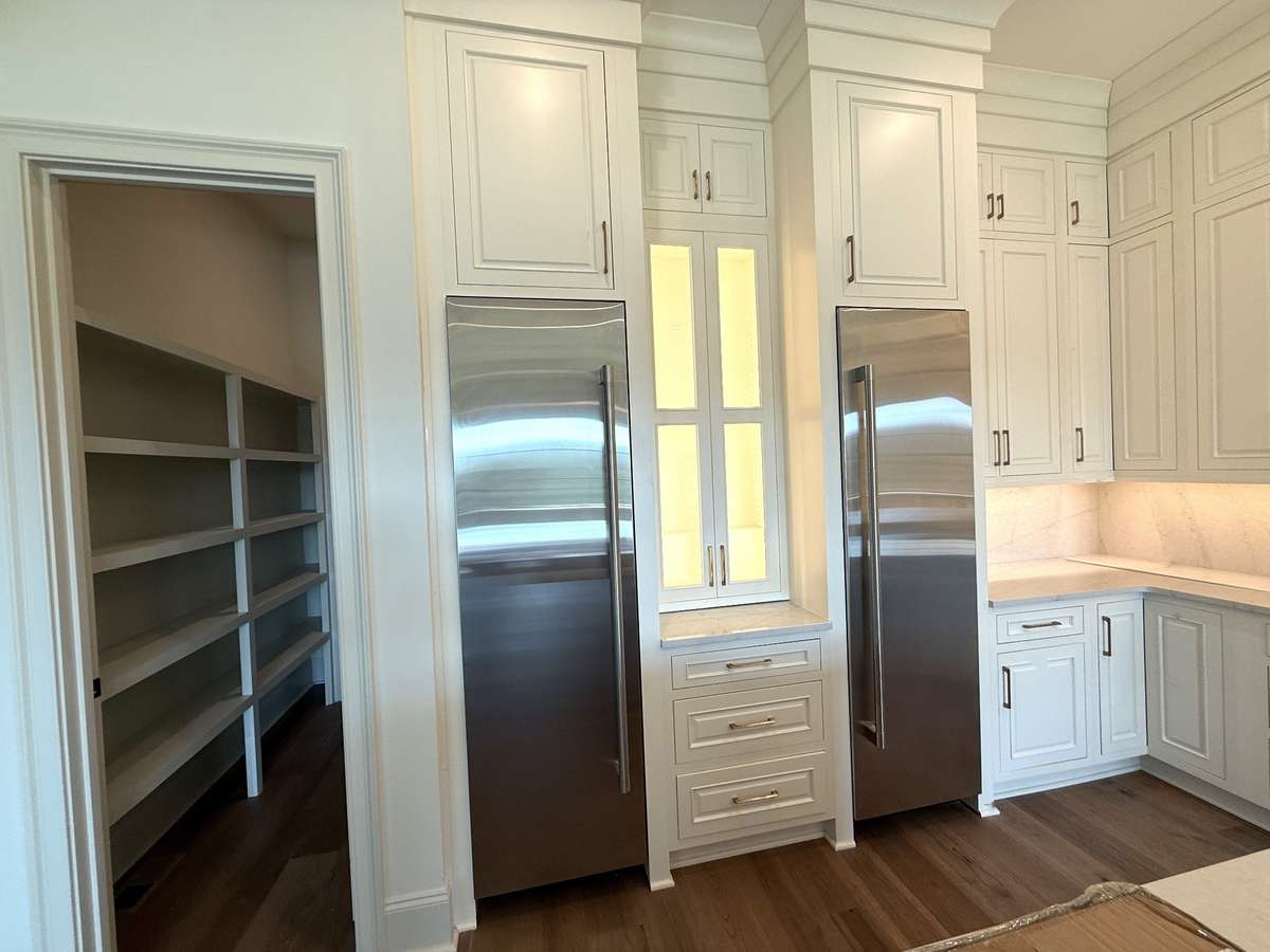 Photos represent another Rutledge plan built with custom items & reflects optional items & upgrades.