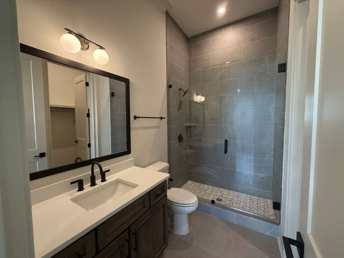 Photos represent another Rutledge plan built with custom items & reflects optional items & upgrades.