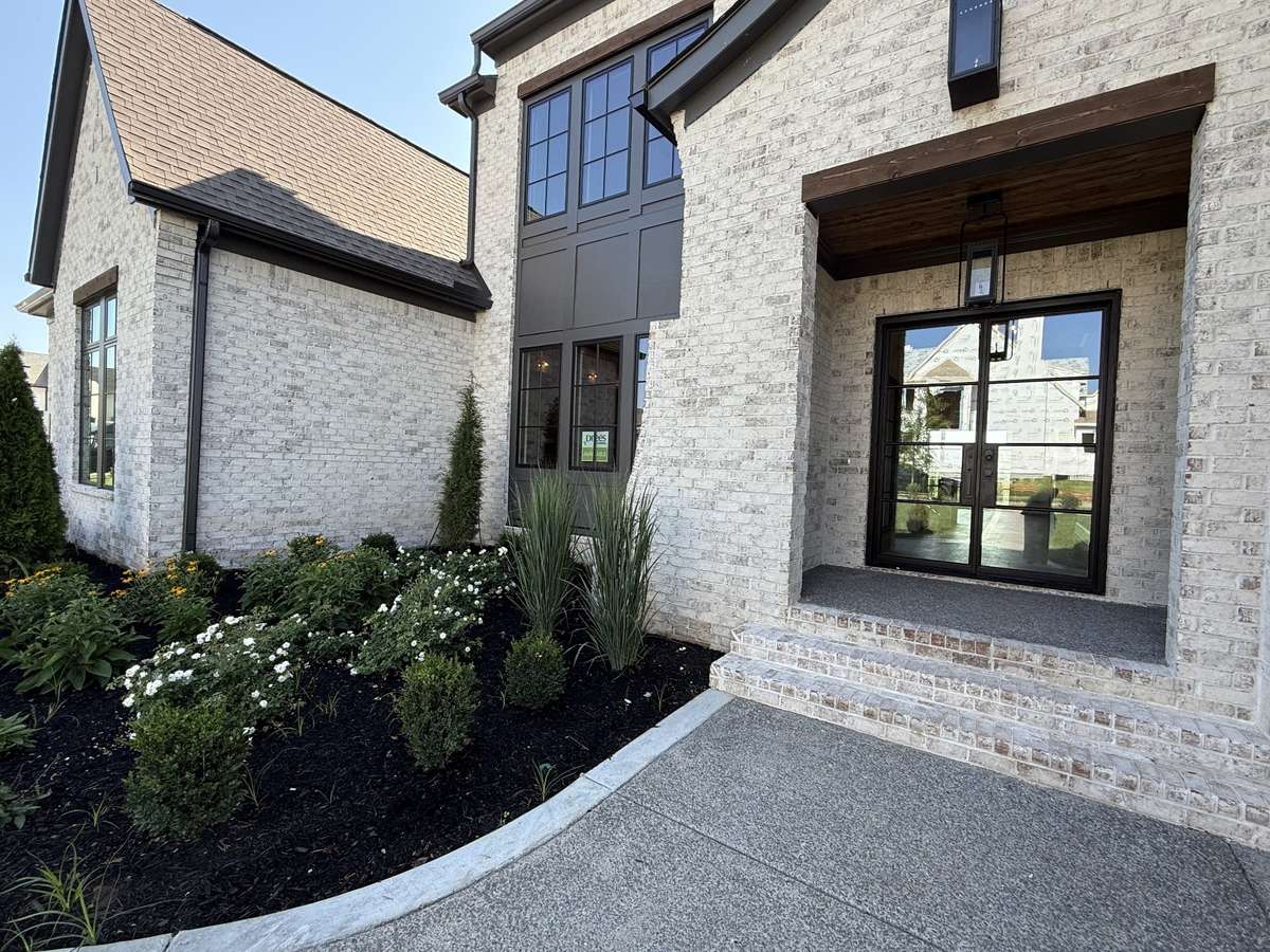 Photos represent another Rutledge plan built with custom items & reflects optional items & upgrades.
