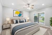 The Primary Bedroom provides a view to the screened patio area and the rear of the property. This room has been virtually staged for your benefit...