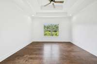 A view of the Primary Bedroom as see from the bathroom suite...