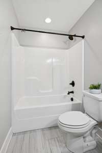 Bathroom 2 upstairs features a tub/shower combo and beautiful tile flooring...