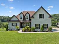 Gorgeous hillside views are visible from both the front and back porches!