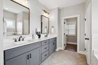 Plentiful cabinet and counter space are also appreciated in the Primary bath suite. This one does not disappoint!