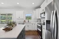 Lovely stainless appliances convey with the property. The refrigerator is negotiable.