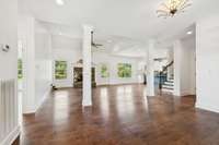 From the front entry you see the family room with gas fireplace. Just to the right in this photo is the dining room space...