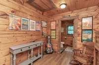 The upstairs loft provides a nice area to read a book, the upstairs bathroom is just beyond this space