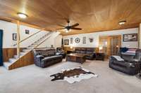 Den and steps to Primary bedroom