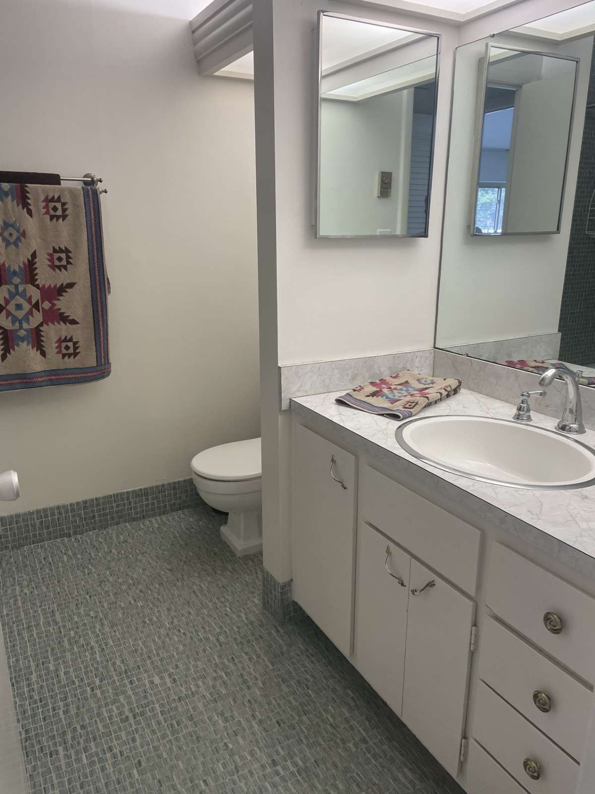 Hall bath would be convenient for guest bath, as well.
