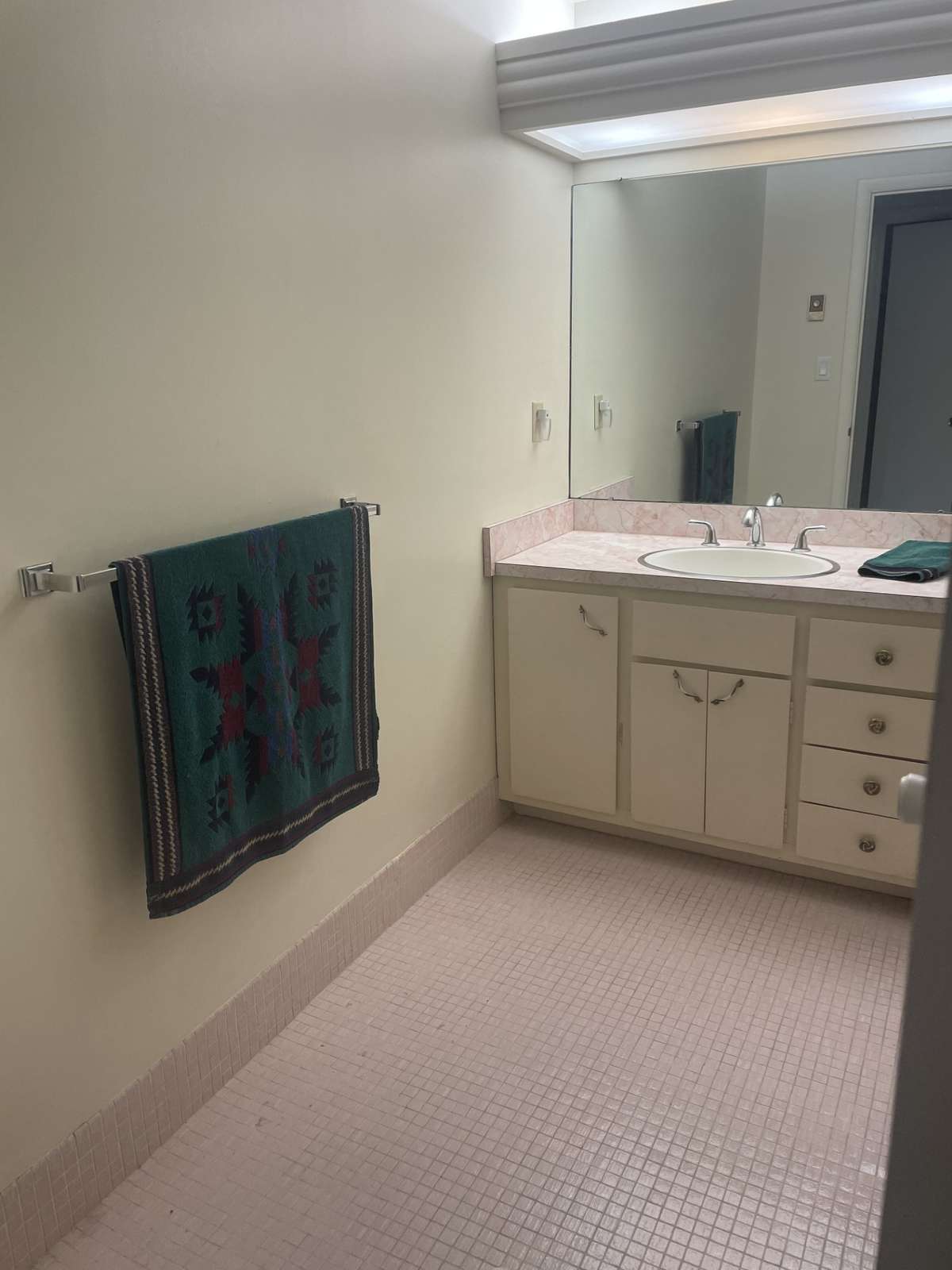 Hall bath with stall shower.