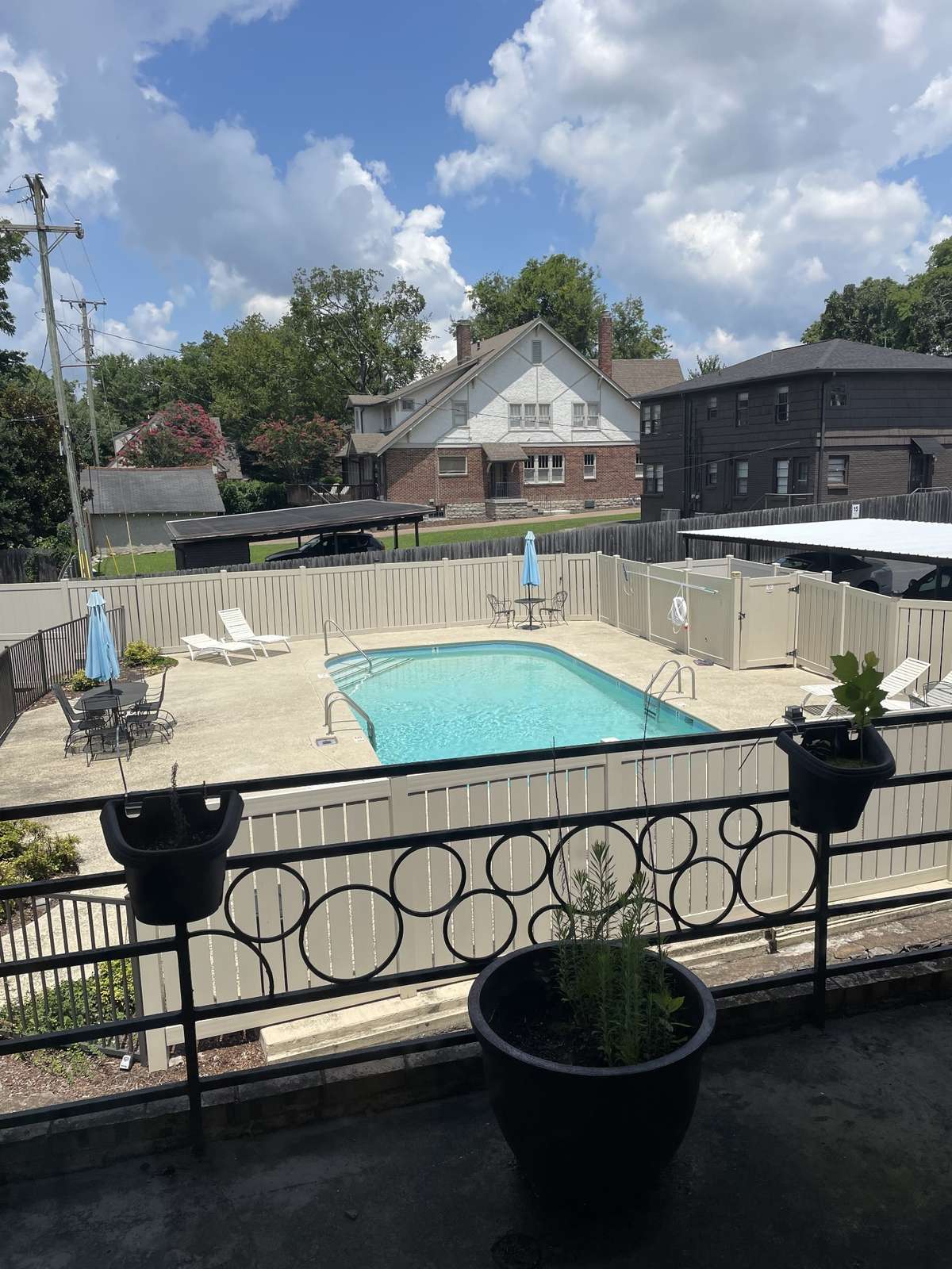 View of pool from balcony.