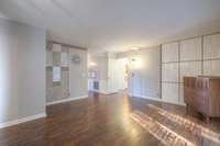Living room without furniture, so you can see the beautiful floors.