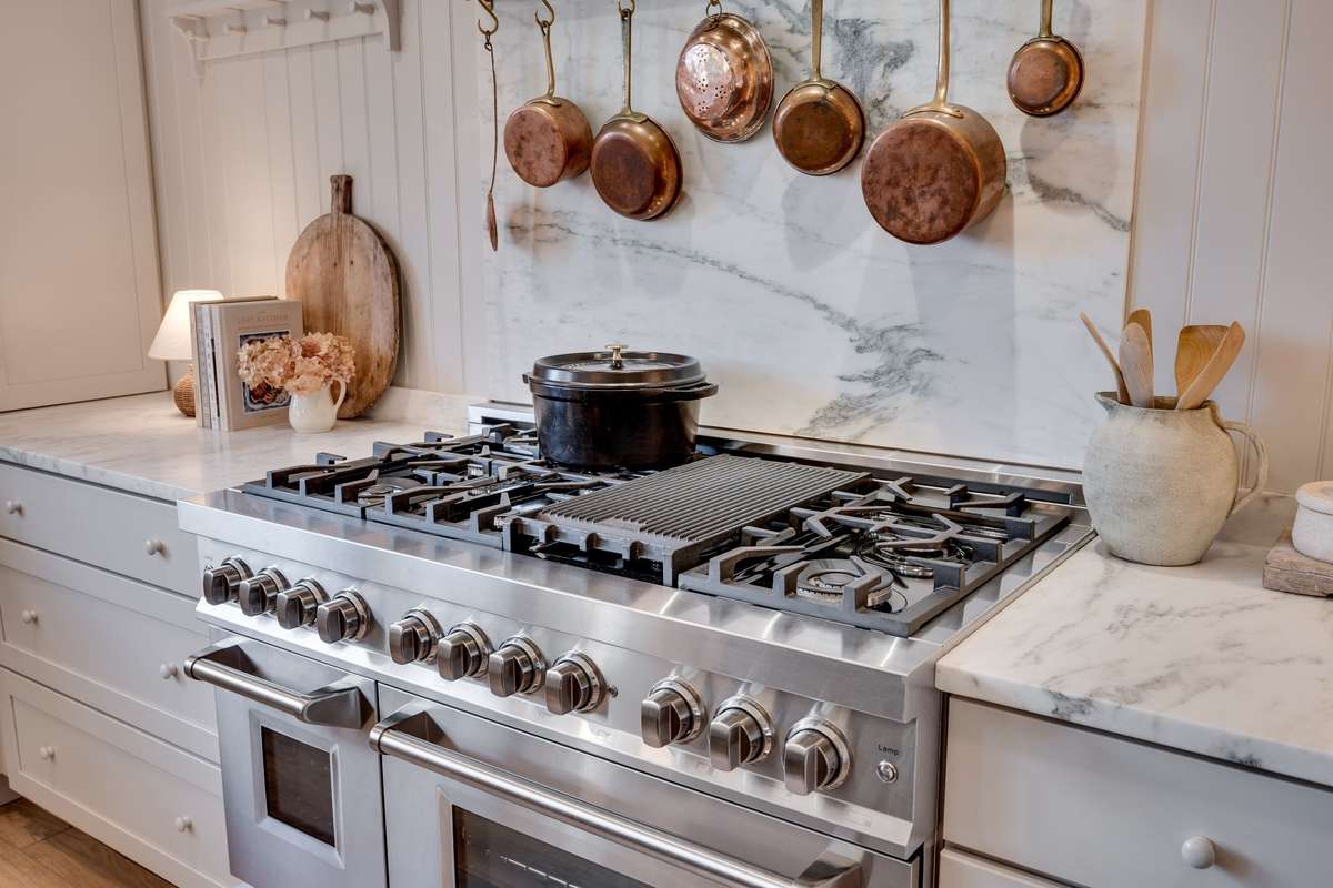 Custom marble countertops, 48" oven range with gas cooktop! A chefs dream kitchen!