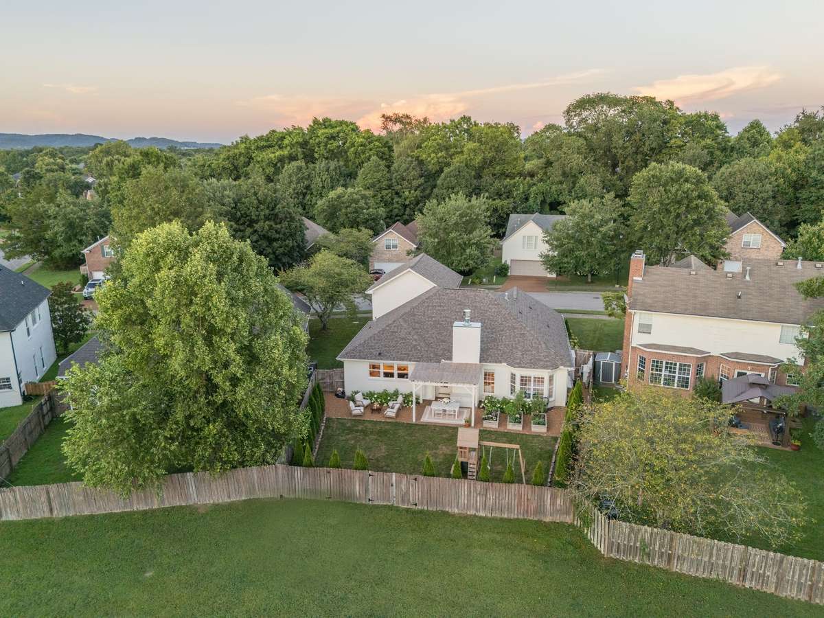 Extra privacy and large green space, which is an added bonus with no homes behind you! New french door gate leading to the private open field.