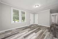 New LVP floors throughout highlights the crisp clean color palette.