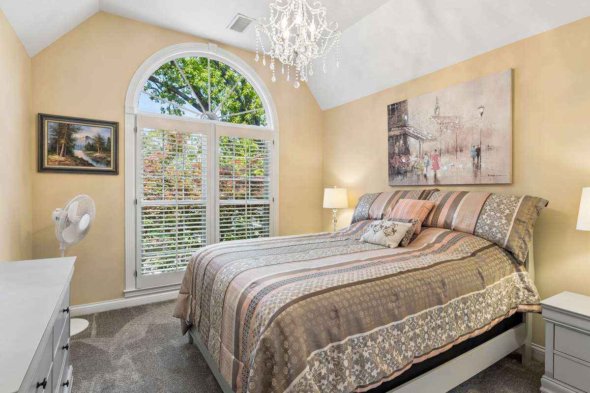 Fourth bedroom with oversized half moon window with plantation shutters & vaulted ceiling.  2230 Northwoods Drive, Murfreesboro, Tn 37130