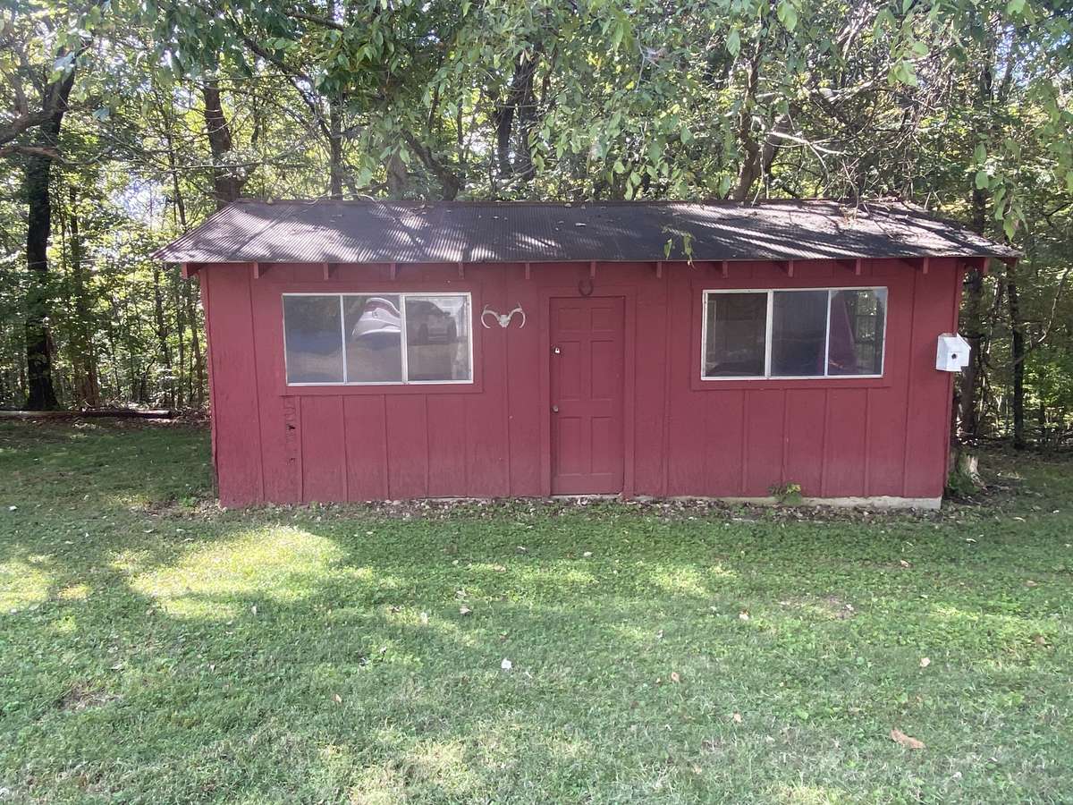 Large storage building included