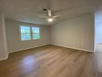 Primary bedroom is a suite of its own. It’s absolutely enormous and has 3 closets inside. 1 would make a great office nook.