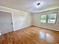 The upstairs layout offers potential to add a second kitchen with sitting area—ideal for a guest suite, multi-generational living, or added entertaining space.