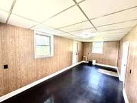Mud Room is oversized and room could be also used as a game room, hobby room, or storage for sports or hunting equipment