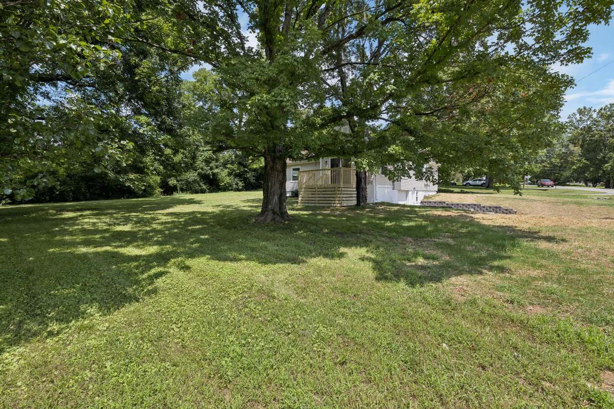 You will enjoy the half acre yard and mature trees!