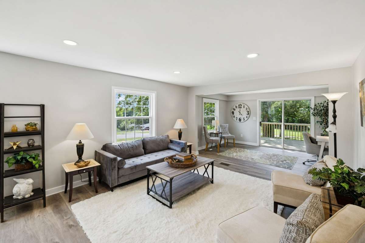 The Open Floor plan continues with the Living room and Flex space currently set up as an office