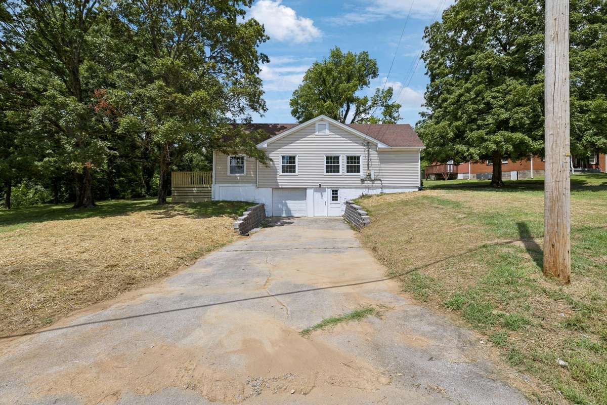 Downstair basement space has a separate entrance and garage - would be perfect for an office, in-law suite or Airbnb!