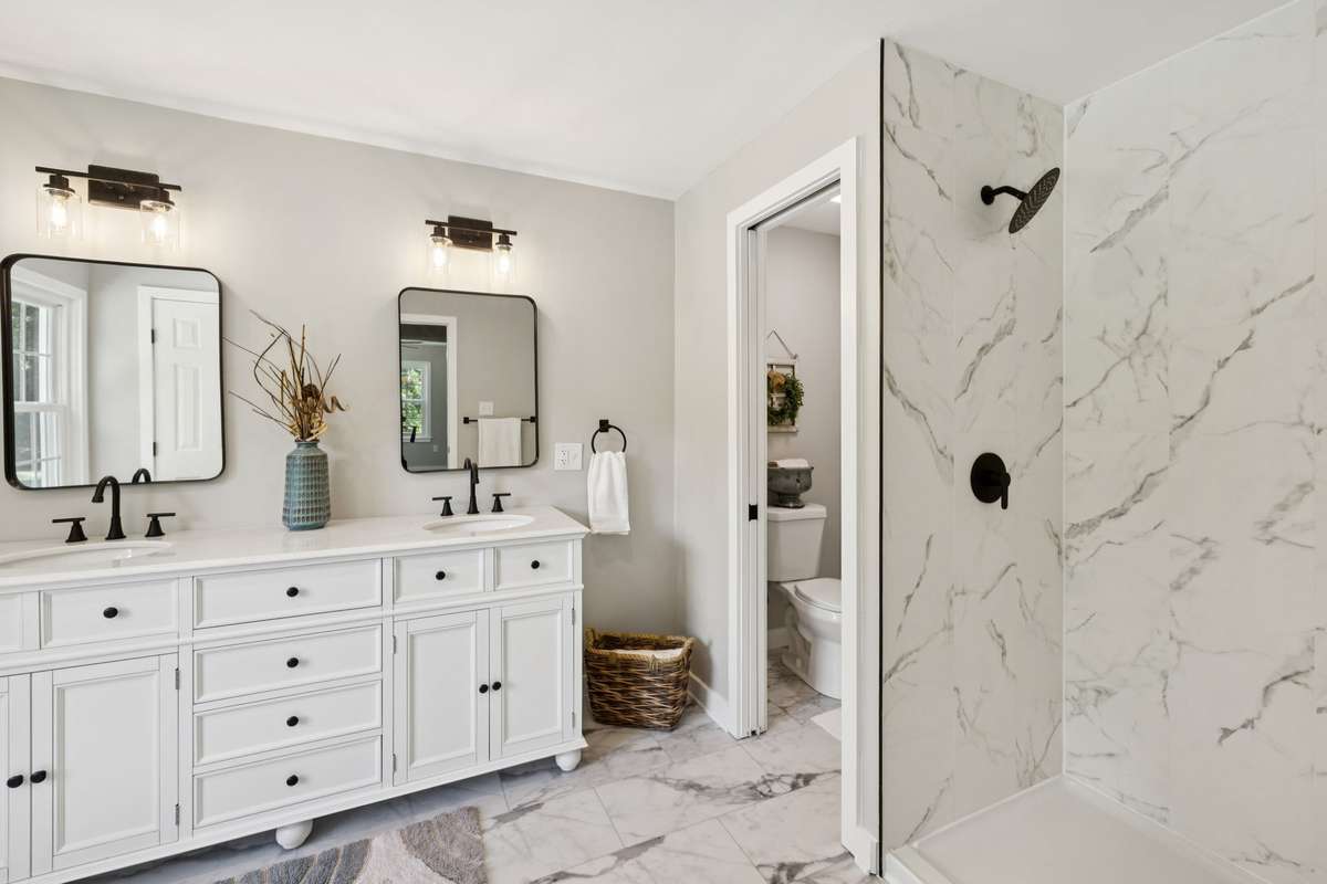 Beautiful!  Escape to this Primary Bathroom for long hot showers!