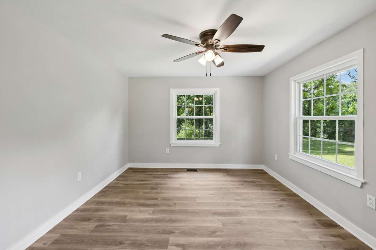 Primary Bedroom has a great view of the large backyard