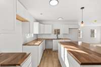 Beautiful Kitchen with finished wood countertops and tons of storage