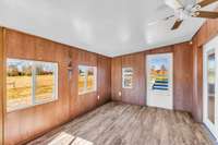 Enjoy relaxing year round in this great sunroom that would be a great hobby room or office.