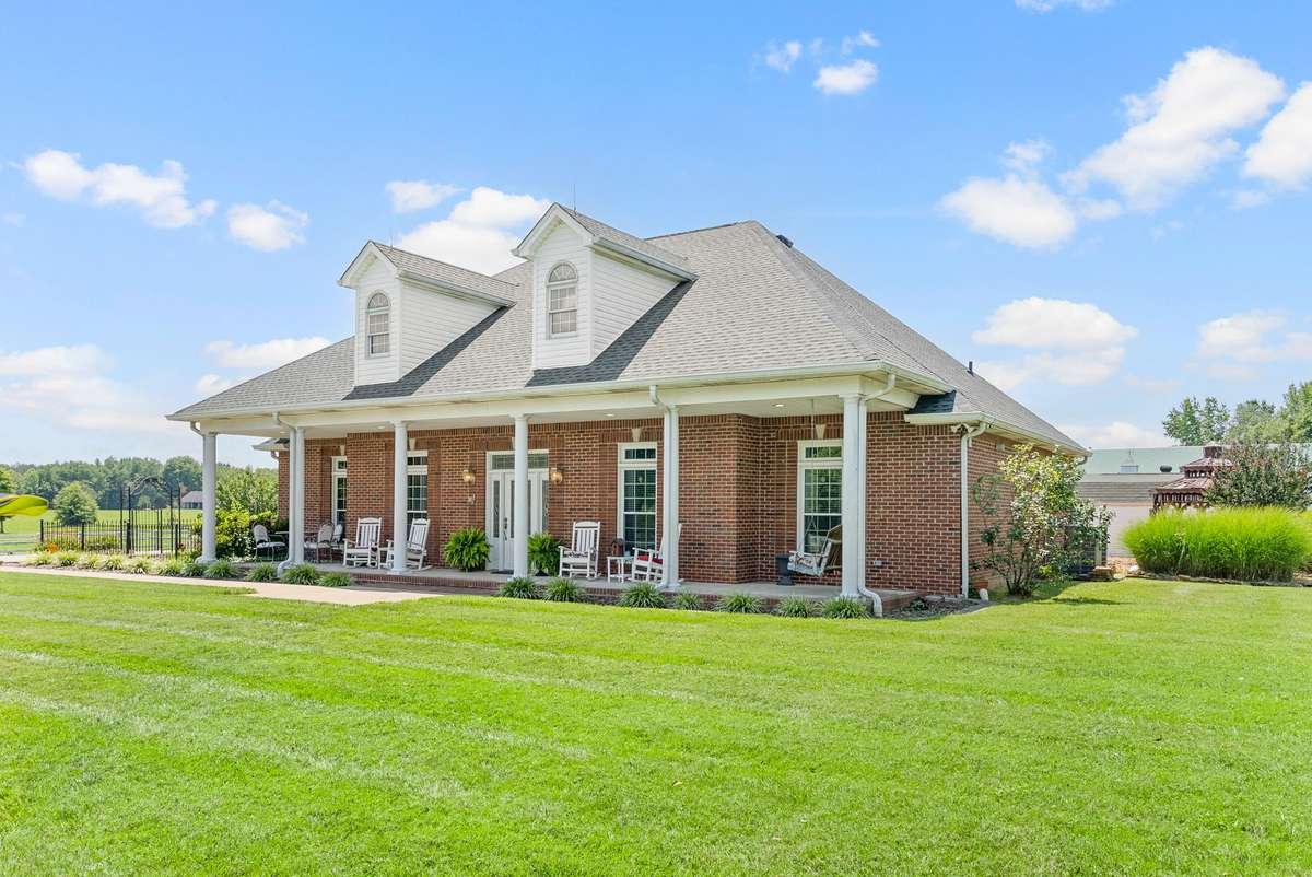 All brick custom home with everything right outside your back door!